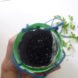 bottle planters, recycled bottle planters, hanging planters, diy planters, how to make a bottle planter, soda bottle planter, recycled materials, green gardening, eco gardening