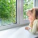 change your windows, insulating windows, efficient windows, girl at window