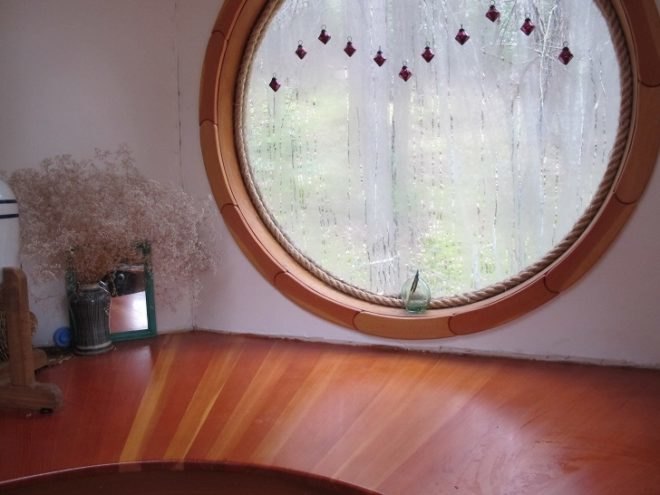 round windows, nautical rope, handmade counters, recycled wood