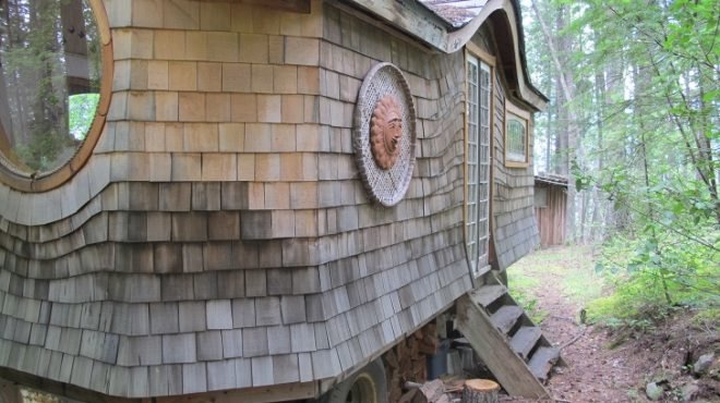 eyebrow entrance, cedar shakes, homemade house