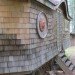 eyebrow entrance, cedar shakes, homemade house