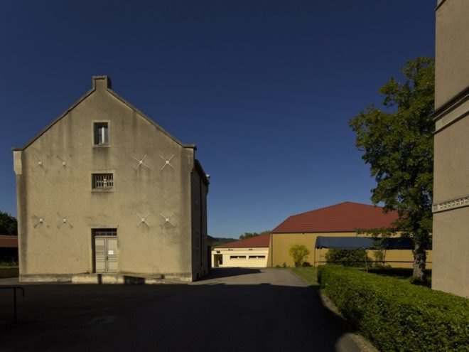 Prison, renovation, Berdaguer & Péjus, Gue(oh)st House, Marcel DuChamp, France, spooky house, halloween, house with a spooky white veil, green design, sustainable design, eco-design