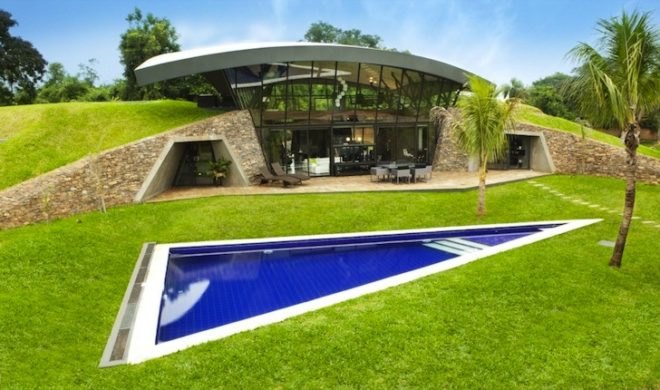 BAUEN, Two Houses, Paraguay, green roof, sweeping arched roofs, green design, natural materials, sustainable design, eco-design, cave homes, eco-luxe architecture