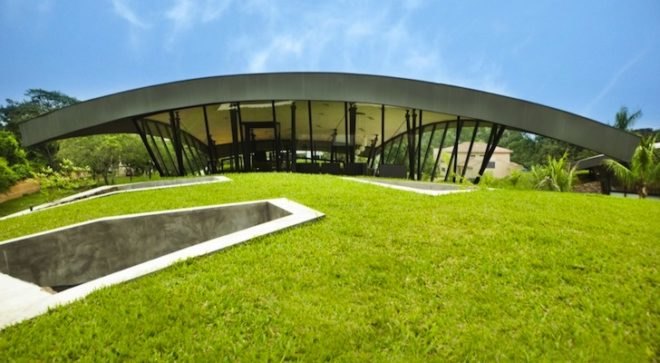 BAUEN, Two Houses, Paraguay, green roof, sweeping arched roofs, green design, natural materials, sustainable design, eco-design, cave homes, eco-luxe architecture