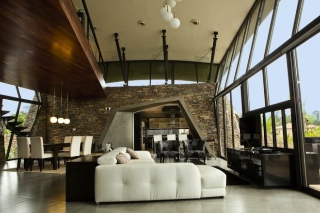 BAUEN, Two Houses, Paraguay, green roof, sweeping arched roofs, green design, natural materials, sustainable design, eco-design, cave homes, eco-luxe architecture