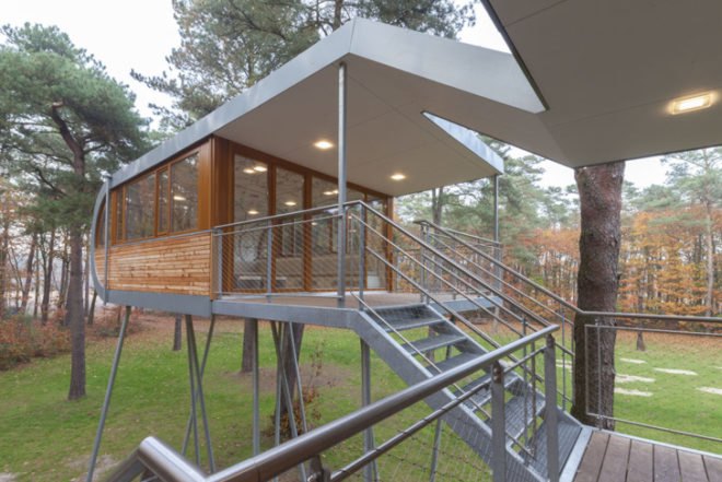 Baumraum Architects, Hechtel-Eksel Treehouse, self-sufficient treehouses, eco-friendly retreats, floating houses, German architects, energy efficient conference center