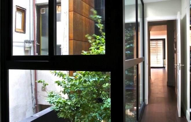 James & Mau, Madrid, Spain, historic buildings, Corten steel, daylighting, energy efficiency, solar gain, thermal massing, indoor trees, green design, sustainable design, eco-design