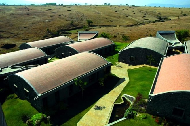 rolling hills, India, Pune, Maharashtra, Madhav Josh, boarding school, natural materials, daylighting, education, green design, passive design, sustainable design, skylights,