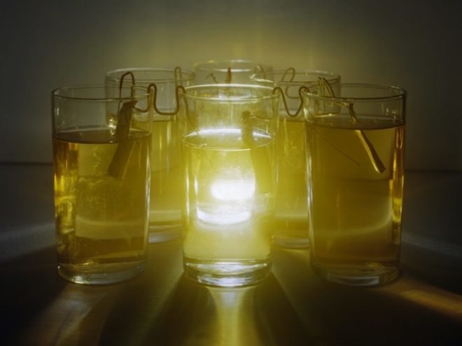 Caleb Charland, orange battery, citric acid battery, fruit-powered battery, eco-art, photography, clean energy, renewable energy, potato battery, apple battery, vinegar battery, design, eco-design, sustainable design