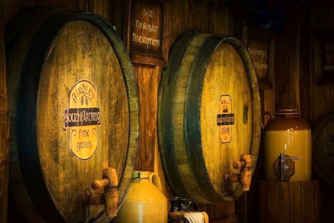 Green Dragon Pub, hobbit houses, hobbits, Lord of the Rings, Peter Jackson, New Zealand, North Island, trilogy, Hobbiton, sustainable design, timber furnishings, thatched roof