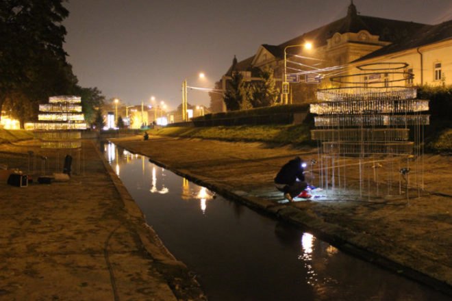 Water Carrier, Elise Morin, reclaimed test tubes, eco art, slovakia, water issues, art installation