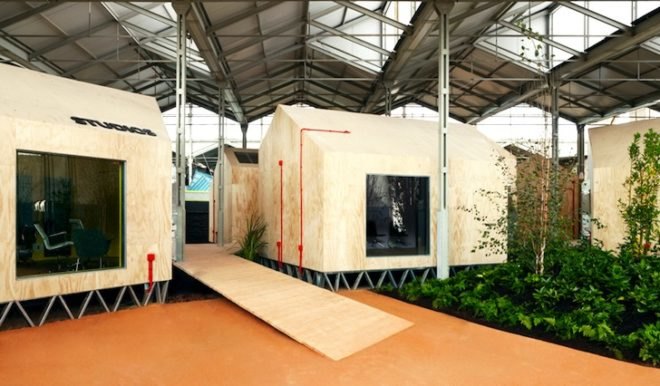 Langarita-Navarro Arquitectos, Red Bull Music Academy, temporary events, temporary music festival, Red Bull Music festival, temporary design, festival design, green design, sustainable design, eco-design, timber huts, gabled huts, sandbag insulation, greenery, urban design, warehouse in Madrid, Spain, acoustics