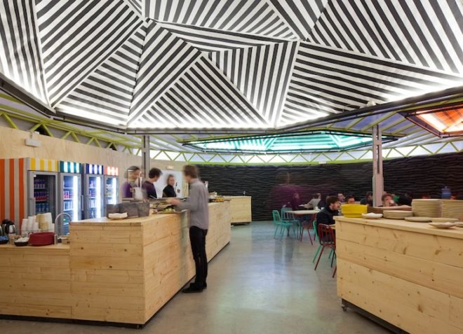 Langarita-Navarro Arquitectos, Red Bull Music Academy, temporary events, temporary music festival, Red Bull Music festival, temporary design, festival design, green design, sustainable design, eco-design, timber huts, gabled huts, sandbag insulation, greenery, urban design, warehouse in Madrid, Spain, acoustics