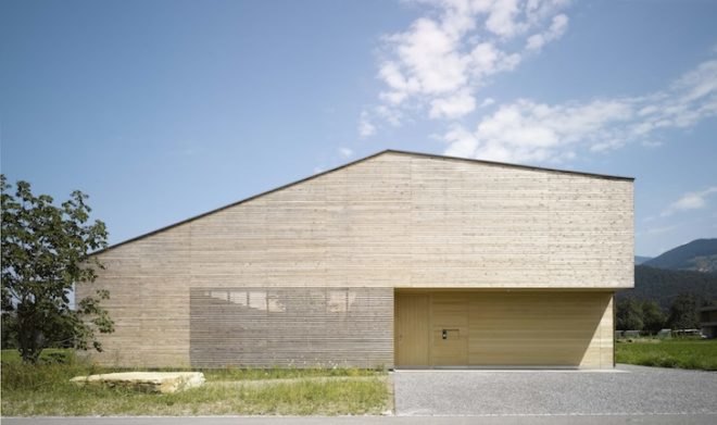 Austria, Bernardo Bader, timber home, wooden home, central courtyard, home with a green lung, green design, sustainable design, eco-design, daylighting, natural ventilation, tree in the center of the house, louvers, Vorarlberg