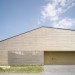 Austria, Bernardo Bader, timber home, wooden home, central courtyard, home with a green lung, green design, sustainable design, eco-design, daylighting, natural ventilation, tree in the center of the house, louvers, Vorarlberg