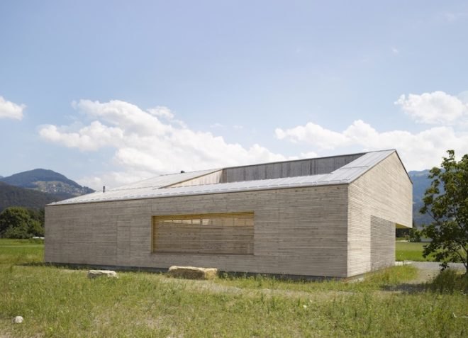 Austria, Bernardo Bader, timber home, wooden home, central courtyard, home with a green lung, green design, sustainable design, eco-design, daylighting, natural ventilation, tree in the center of the house, louvers, Vorarlberg