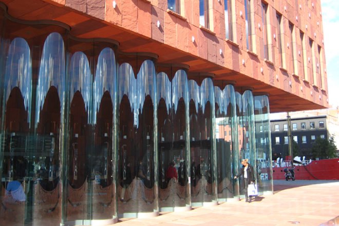 Neutelings Riedijk, MAS Museum , antwerp, belgium, currugated glass, natural light, red stone, hands, poem, aluminum hand, aluminum medallion, Architecture, Daylighting, Recycled Materials