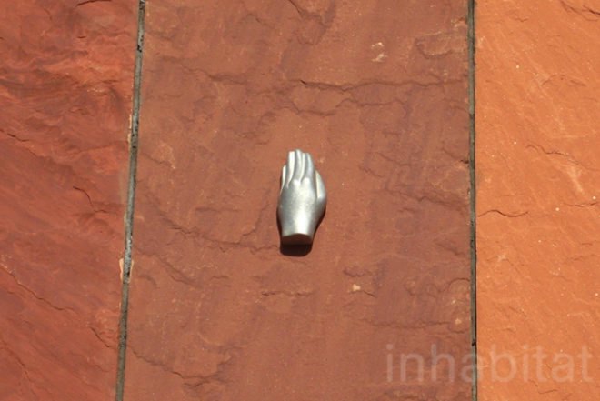 Neutelings Riedijk, MAS Museum , antwerp, belgium, currugated glass, natural light, red stone, hands, poem, aluminum hand, aluminum medallion, Architecture, Daylighting, Recycled Materials