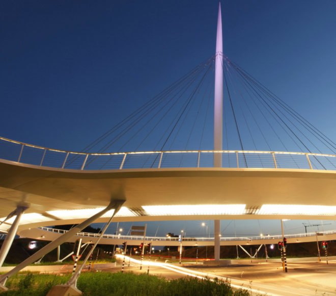 ipv Delft, Netherlands, Eindhoven, Hovenring, architecture, bike bridge, cyclists, pedestrians, traffic, bike safety, walkability, steel, cable bridge, LED lighting