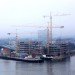 renewable energy, wind turbines, solar cells, biomes, cycling, cycling superhighways, hybrid buses, public transportation, energy efficiency, new builds, retrofit old buildings, insulation, green jobs, green economy
