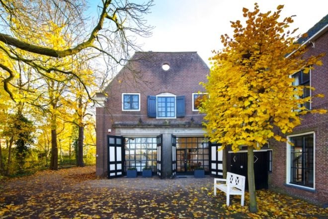 daylighting, adaptive reuse, green renovation, Zecc Architecten, Breukelen House, The Netherlands, green design, sustainable design, eco-design, wood, renovated coach house, wood-fired stove