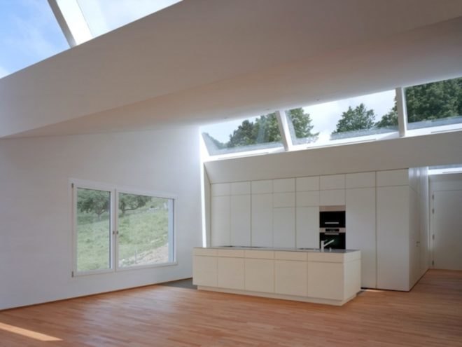 Spillmann Echsle Architekten, House Uesslingen, sawtooth roof, Swiss Design, Switzerland, green design, prefab design, low carbon footprint, daylighting, natural light, sustainable design, eco-design, Switzerland, pitched roof, Kanton Thurgau, prefabricated home