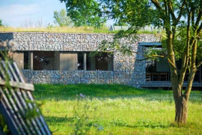 Hunting Lodge, Basarch, czech republic, green roof, earth bermed, earth bermed house, gabion baskets