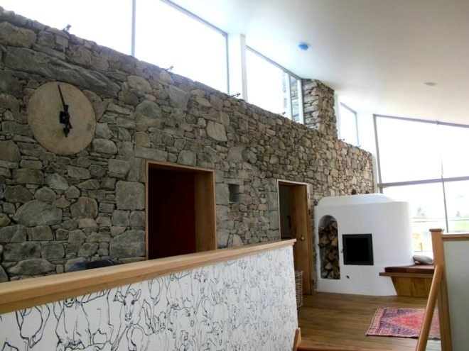 sheep's wool insulation, green design, sustainable design, eco design, sustainable scottish farmhouse, stone farmhouse in scotland, wind-powered home in scotland, wind energy, solar energy, green roof home in Scotland, triple glazing, energy efficiency, UK energy standards