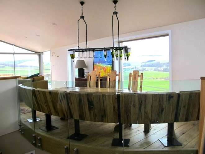 sheep's wool insulation, green design, sustainable design, eco design, sustainable scottish farmhouse, stone farmhouse in scotland, wind-powered home in scotland, wind energy, solar energy, green roof home in Scotland, triple glazing, energy efficiency, UK energy standards