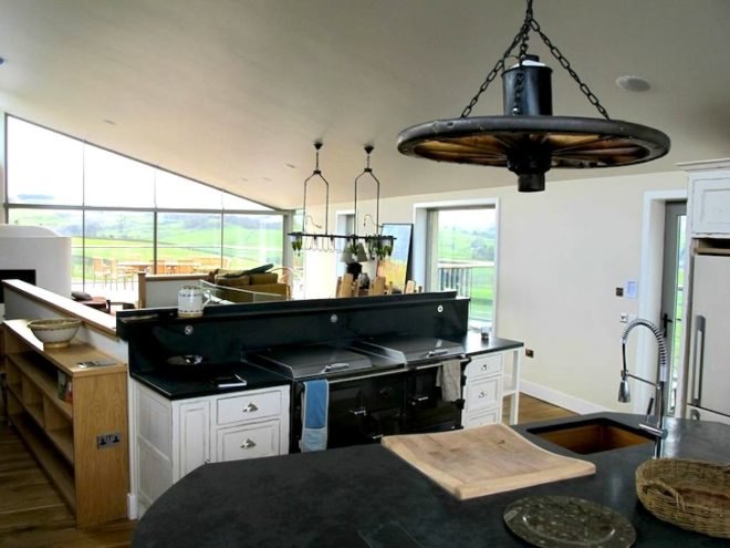 sheep's wool insulation, green design, sustainable design, eco design, sustainable scottish farmhouse, stone farmhouse in scotland, wind-powered home in scotland, wind energy, solar energy, green roof home in Scotland, triple glazing, energy efficiency, UK energy standards