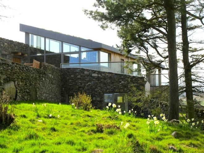 sheep's wool insulation, green design, sustainable design, eco design, sustainable scottish farmhouse, stone farmhouse in scotland, wind-powered home in scotland, wind energy, solar energy, green roof home in Scotland, triple glazing, energy efficiency, UK energy standards
