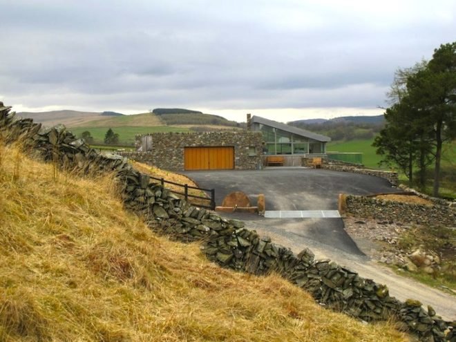 sheep's wool insulation, green design, sustainable design, eco design, sustainable scottish farmhouse, stone farmhouse in scotland, wind-powered home in scotland, wind energy, solar energy, green roof home in Scotland, triple glazing, energy efficiency, UK energy standards