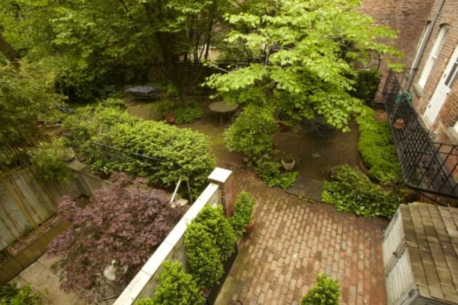 New york real estate, private garden, reclaimed wood flooring, west village homes, 75.5 bedford street, new york’s narrowest home, nyc narrowest home, tiny homes, tiny apartments, nyc tiny apartments, nyc tiny homes, nyc celebrity homes