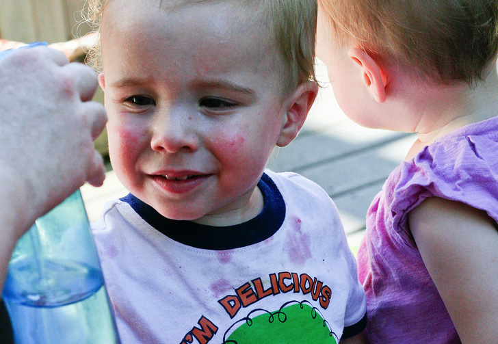 Kid with Spray Bottle