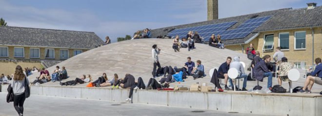 BIG, underground facility, form follows function, retrofit architecture, courtyard, custom benches, LED lighting, solar panels, underground architecture, organic courtyard