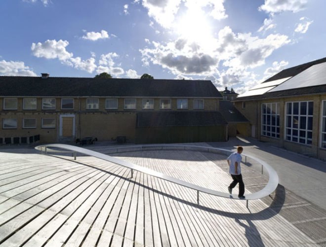 BIG, underground facility, form follows function, retrofit architecture, courtyard, custom benches, LED lighting, solar panels, underground architecture, organic courtyard