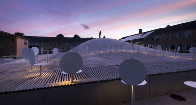 BIG, underground facility, form follows function, retrofit architecture, courtyard, custom benches, LED lighting, solar panels, underground architecture, organic courtyard