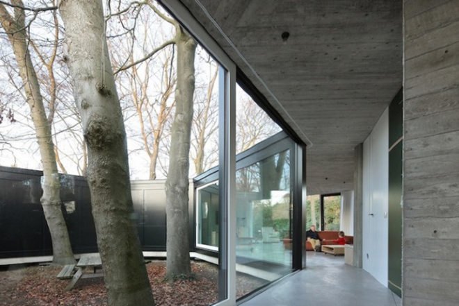 Architecten DVVT, glazed, donut, House BM, windows, natural light, Belgium, stilts, surrounded by trees, architecture, Daylighting,