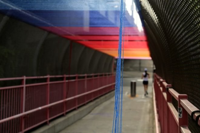 hottea, luna park, yarn bombing, williamsburg bridge, pedestrian walkway, rainbow thread, rainbow canopy, urban intervention, urban art, art installation