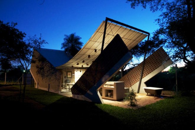 Javier Corvalán, Laboratorio de Arquitectura, curvy home, Casa Hamaca, Paraguay, Catenary Curve, reclaimed materials, bricked wall, galvanized iron roof, Architecture, Daylighting, Recycled Materials