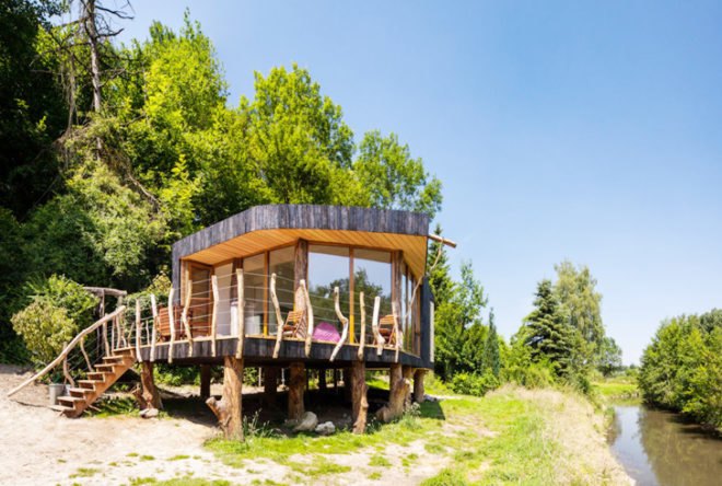 Upfrnt Architects, South Limburg house, house on stilts, wooden house, Netherlands architecture, wastewater purification, holiday house, weekend retreat, Shou-Sugi-Ban, daylit homes, glass facades, underground ventilation, solar panels, energy efficient building, solar energy
