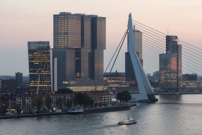 oma, rem koolhaas, de rotterdam, vertical city, erasmus bridge, Wilhemina Pier, mixed use building, mullions, multipurpose building, Rotterdam skyline, floor to ceiling windows, rotterdam economic revival