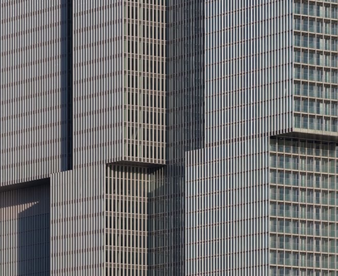 oma, rem koolhaas, de rotterdam, vertical city, erasmus bridge, Wilhemina Pier, mixed use building, mullions, multipurpose building, Rotterdam skyline, floor to ceiling windows, rotterdam economic revival