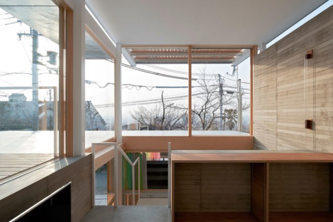 ishikiri house, tato architects. japan architecture, contemporary house in japan, tiny contemporary house, context, fitting in new house in historic neighborhood, concrete walls, translucent roof, corrugated metal skin, modern home in historic Japan