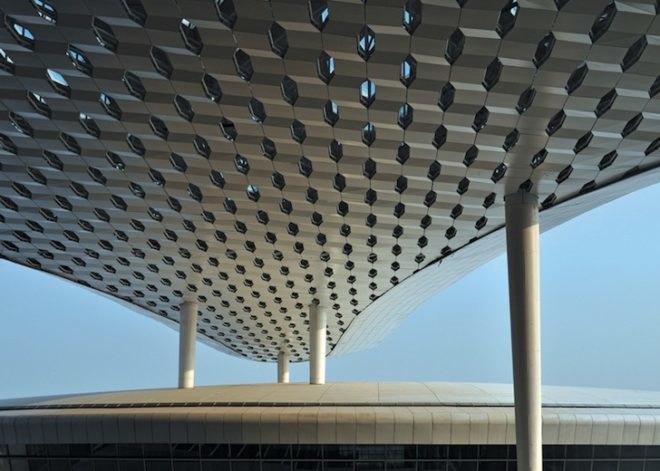 studio fuksas, honeycomb terminal, Shenzhen Bao'an International Airport, hexagonal skylights, airport terminal, triple height ceilings, Chinese construction, air conditioning vent trees, Chinese airport design, terminal design
