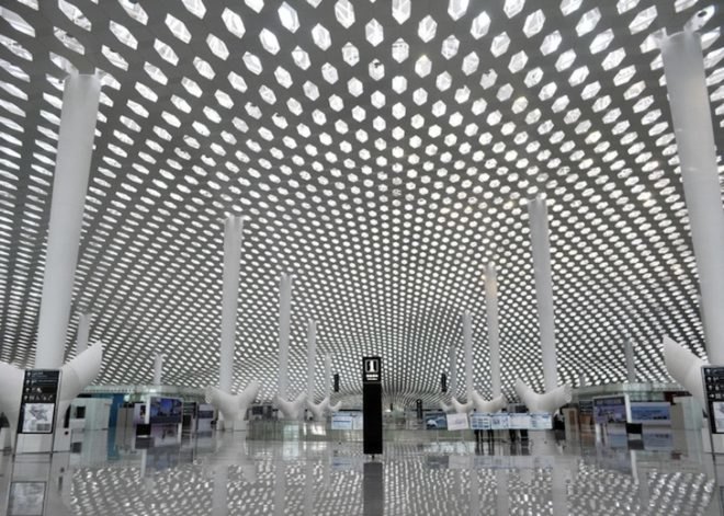 studio fuksas, honeycomb terminal, Shenzhen Bao'an International Airport, hexagonal skylights, airport terminal, triple height ceilings, Chinese construction, air conditioning vent trees, Chinese airport design, terminal design