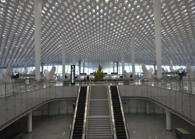 studio fuksas, honeycomb terminal, Shenzhen Bao'an International Airport, hexagonal skylights, airport terminal, triple height ceilings, Chinese construction, air conditioning vent trees, Chinese airport design, terminal design