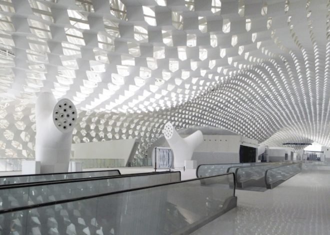 studio fuksas, honeycomb terminal, Shenzhen Bao'an International Airport, hexagonal skylights, airport terminal, triple height ceilings, Chinese construction, air conditioning vent trees, Chinese airport design, terminal design
