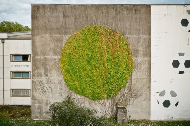SpY Circular garden art in Besançon, France, urban art in Besancon, street art in France, SpY's urban art,