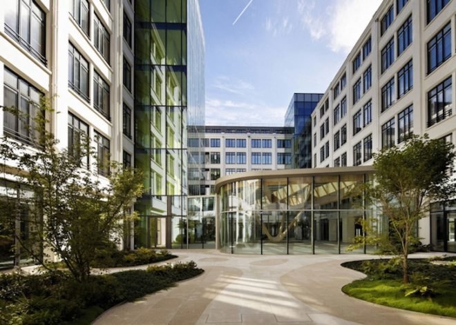 Agence Jouin Manku, office space, amenities wing, Société Foncière Lyonnaise, IN/OUT, iridescent shingles, stainless steel tiles, glass pavilion, bush hammered concrete, contemporary architecture, avant garde architecture